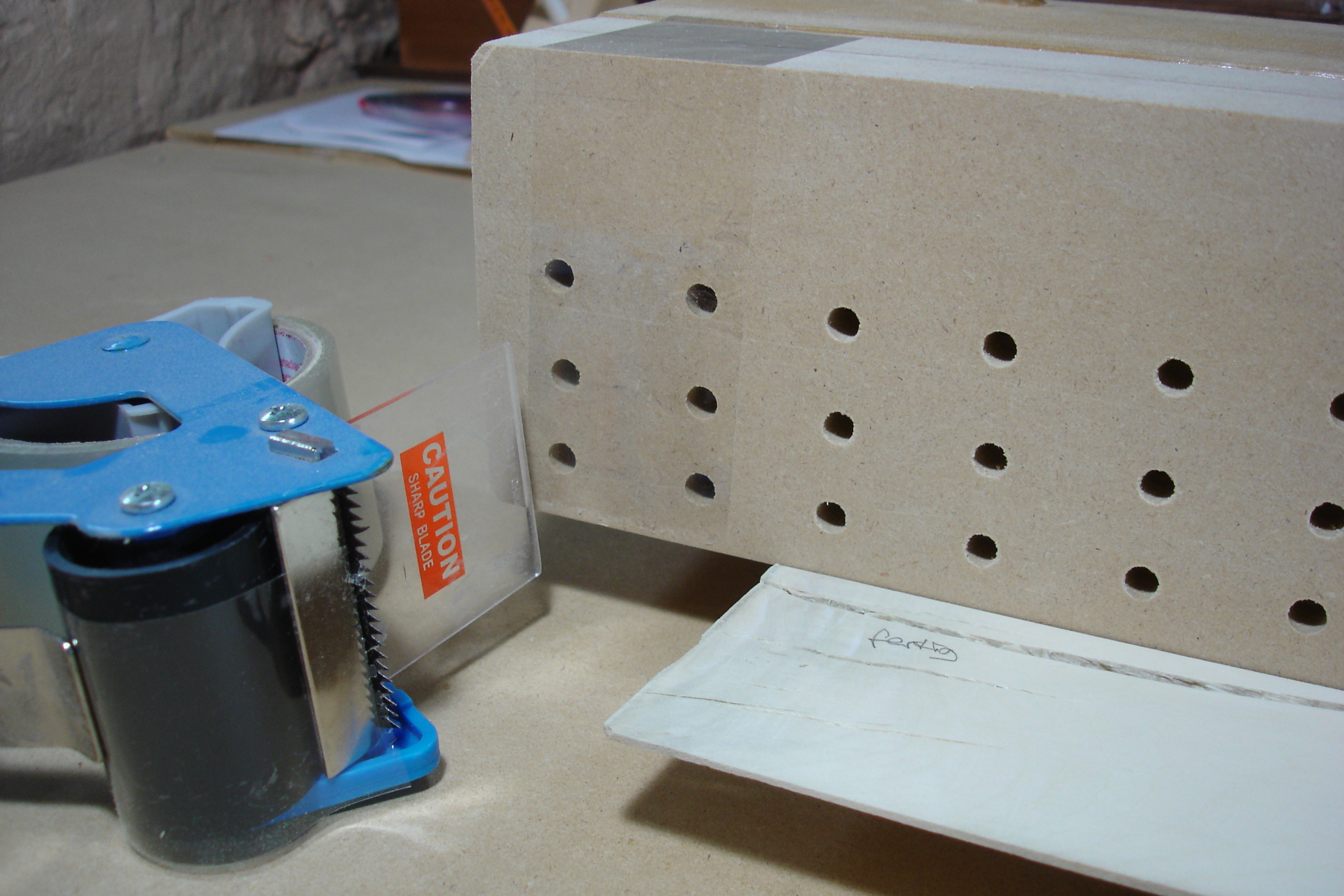 VacuumFence01 Unneeded holes can be closed with tape if the veneer is smaller than the fence.